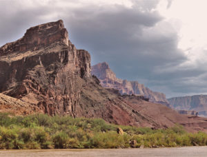 Monsoon clouds behind the canyon walls