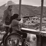 Woman in a wheel chair doing skeet shooting